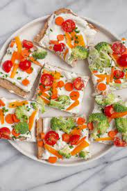 Here, guests are treated to a the hollowed out cabbage is a creative way to serve any cold dip and compliments the fresh vegetables. Cold Veggie Pizza Appetizers Wholefully