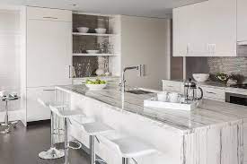 Granite from $35 sq ft. White Flat Front Kitchen Cabinets With Quartzite Countertops And Stainless Steel Mini Brick Tiles Contemporary Kitchen