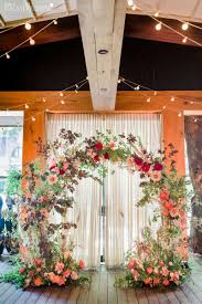 Which diy floral wedding arch that fits your style? A Burgundy Inspired Secret Garden Wedding Elegantwedding Ca Wedding Arch Flowers Garden Wedding Decorations Floral Arch Wedding