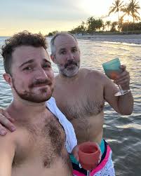 three years ago today we moved to key west and went to the beach and took  this pic. tonight we are celebrating the best decision we ever made,  looking a lot less