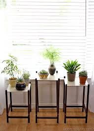 Spring Is In The Air And It S Time To Start Spreading The Joy Throughout Your Home Nooks And Crannies Fi Plant Stand Indoor Modern Plant Stand Diy Plant Stand