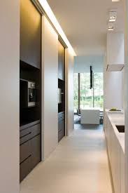 If you have a compact kitchen, consider whether sliding cabinet doors will work as part of your kitchen's design. How Sliding Doors Will Help You To Achieve An Open Plan Kitchen Amberth