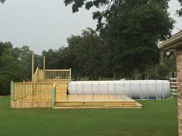 This Is Our Pool Deck For A Rectangle Above Ground Pool I Found Very Few Pictures Of Rectangular Pool Backyard Pool Landscaping Rectangle Above Ground Pool