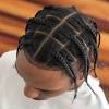 Messy men braids pulled back. 1