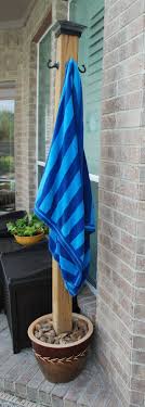 Diy Pool Towel Holder We Made This Stand To Hang Our Wet Pool Towels To Dry After Swimming Pool Decor Backyard Pool Pool Patio
