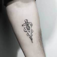 This tattoo includes a black ink outline geometrical lions face made out of different triangles. 65 Amazing V Letter Tattoo Designs And Ideas Body Art Guru