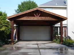 How To Build A Wooden Carport Off Your Existing Garage Carport Garage Garage Pergola Wooden Carports