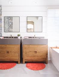 Gold accents add texture and visual interest while scavo™ glass shades create a warm glow. Bathroom Remodel Media Links Savvy Interiors