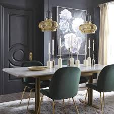 This chair is upholstered in an emerald green velvet, with button tufting and brass nailhead trim. Dark Green Dining Chairs