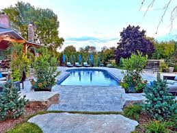 Building a pool in your backyard can be a thrilling experience. Pool Landscaping Ideas