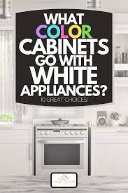 Chic antique style kitchen cabinets of wooden materials in white and cream. What Color Cabinets Go With White Appliances 10 Great Choices Home Decor Bliss