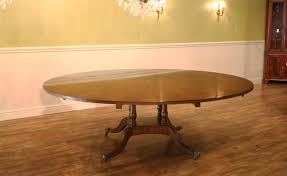 This rectangular table is built from tough wood with block legs. Large 64 88 Inch Expandable Round Mahogany Dining Table
