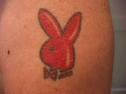 Below the cross, is the word, loser tattooed. Playboy Bunny Tattoos Meanings Designs And Ideas Tatring