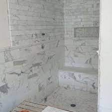 You don't want to apply a sealer to marble or natural stone in a shower (with one exception discussed below) or other wet environments because you run into situations where the. Master Shower Day One Statuary Marble From Waterworks Including Baseboards And Chair Rail 6x12 3x6 And 1 H Shower Tile Subway Tile Showers Statuary Tile