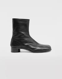 Maison margiela's signature tabi boots first took the fashion scene by storm when it debuted at martin margiela's inaugural show back in 1989. Maison Margiela Tabi Leather Ankle Boots Men Maison Margiela Store