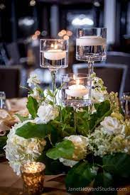 You can instead take a look at a free candle holders just for inspiration. Simple And Elegant Wedding Centerpiece Made Of White Flowers And Ste Elegant Wedding Centerpiece Flower Centerpieces Wedding Wedding Table Centerpieces Elegant