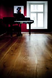 Bolefloor Curved Wooden Floorboards With A Piano Bolefloor Flooring Wood Floors