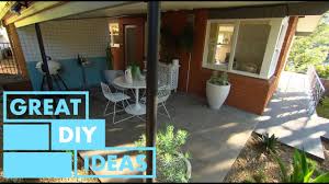 Once the base color is dry to the touch, use painters' tape to mark your pattern. Jason And Tara Turn A Carport Into A Stunning Outdoor Entertaining Area Diy Great Home Ideas Youtube