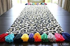 Diy Tassel Leopard Table Runner In 2020 Diy Tablecloth Diy Tassel Table Runners