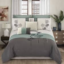 The jacquard woven comforter is featured with an elegant paisley pattern in a soft color palette of blue, brown, and ivory. 8pc Emilie Comforter Set Blue Gray Riverbrook Home Target