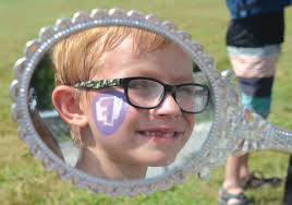 HAVING A BALL AT LAWN