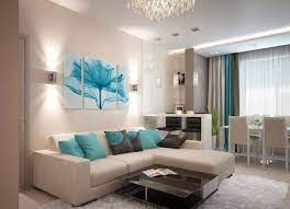 Wohnzimmer modern einrichten mit flachem quadratischem couchtisch aus holz und leder giro. Wohnzimmer Modern Gestalten Kalte Oder Warme Tone Salas Coloridas Salon De Casa Decoracion De Interiores