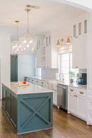 Maybe you would like to learn more about one of these? A Coastal Farmhouse In White Done So Right Coastal Farmhouse Kitchen Modern Farmhouse Kitchens Rustic Kitchen