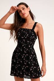 In The Garden Black Floral Print Skater Dress Mod And Retro Clothing In 2020 Floral Dress Black Floral Dress Casual Black And Pink Dress
