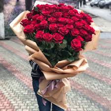 Huge bouquet of red roses.love the idea with one white rose in the middle.transmitting the message that i.m one in a billion! Buy 51 Big Red Rose With Delivery Chisinau Moldova