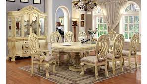 A dining room set with table, buffet hutch and china cabinet rrgs. Majesta Antique White Dining Set