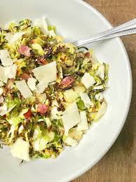 I added a squeeze of lemon, shredded sharp aged cheddar, and a pinch of pecorino cheese. Crispy Brussels Sprouts With Bacon Parmesan And Balsamic Confessions Of A Fit Foodie