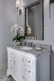 Transitional Gray And White Powder Room With Chrome Mirror Powder Room Vanity Powder Room Ideas Elegant Diy Bathroom Decor
