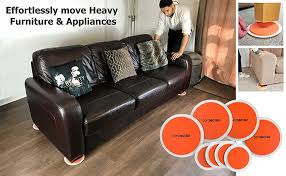 There are videos online where someone places the slider next to the leg on the floor, lifts up the edge of the piece of furniture, and slides the slider under the leg with a foot swish. The Super Furniture Sliders Genuine Original Orange Discs By Diy Doctor Moving Heavy Furniture Has Never Been Easier 8 Piece Value Pack Amazon Com