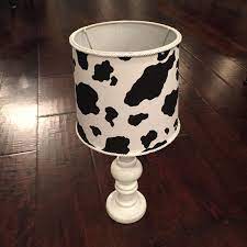 Add a mod and urban feel to contemporary spaces. Lamp Cowprint Fabric Black White By Holychicboutiqueco On Etsy Lamp Cow Print Shade Cover
