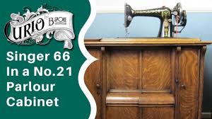 Most early full size machines were normally operated by treadle mechanisms. Singer 66 Lotus In A Model 21 Parlour Cabinet Youtube
