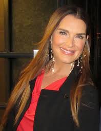 The warm cranberry red will spice up your day while the crisp white bands with rick rack trim. Brooke Shields Wikipedia