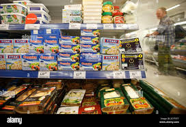 Imported Dairy Food Products Top And Other Food Items Are Displayed For Sale At A Grocery Store In Moscow August 7 2014 Moscow Imposed A Total Ban On Imports Of Many Western