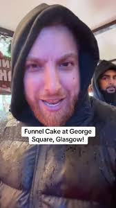 Trying to funnel cake at George Square, Glasgow #Glasgow #ChristmasMarkets