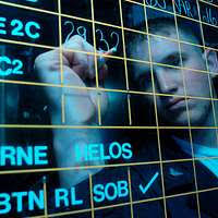 In the Carrier Air Traffic Control Center aboard the aircraft carrier USS  John F. Kennedy (CV 67), Sailors man their stations for case three flight  operations.