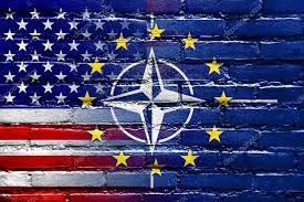 Nato, EU and USA Flag painted on brick wall Stock Photo by ©PromesaStudio 53771303