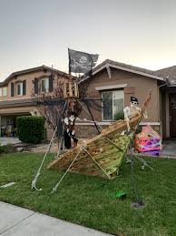Put a red 'x' above your favor table. Halloween Pirate Ship Pirate Halloween Decorations Halloween Yard Pirate Decor