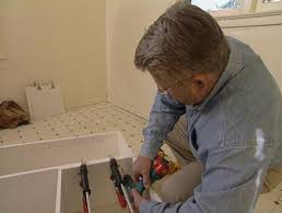 How to level uneven concrete floors for maximum flatness. The Trick To Hanging Kitchen Wall Cabinets Ron Hazelton