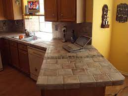 Tiling the counter is a n easy and simple procedure that anyone can handle with the right equipment. Tile Over Laminate Counter Tops Trendy Kitchen Tile Tile Countertops Kitchen Kitchen Countertops