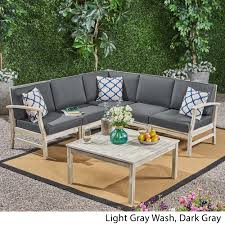 Your living room might be all set for a housewarming party but without a proper coffee table, the whole image will not be complete. Perla Outdoor 6 Piece Acacia Wood Sectional Sofa And Coffee Table Set By Christopher Knight Home On Sale Overstock 26474507