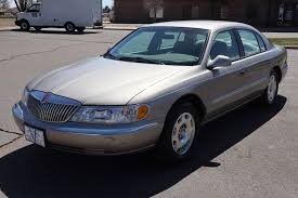 Image result for Light Parchment Gold 1999 Town Car