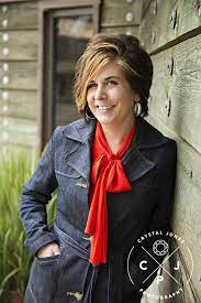 Headshot For Real Estate Agent In Sacramento Headshots Style Red Leather Jacket