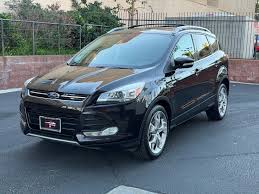 Image result for Tuxedo Black 2012 Escape