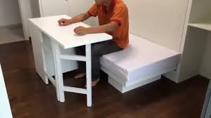 The wall behind the tv stands out with a red backsplash, which matches the couch right in front of the hd tv. Hwb Hidden Table Arc Tampines Ec Rm3 Multi Purpose Bench Sofa Coffeetable Kid S Dining Playtable Youtube