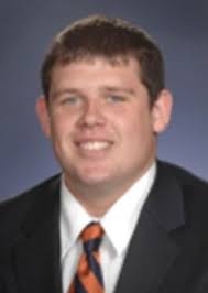 Suit: Former U of I football player forced back early from injury