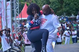 Image result for pictures of winnie nwagi being squeezed on stage